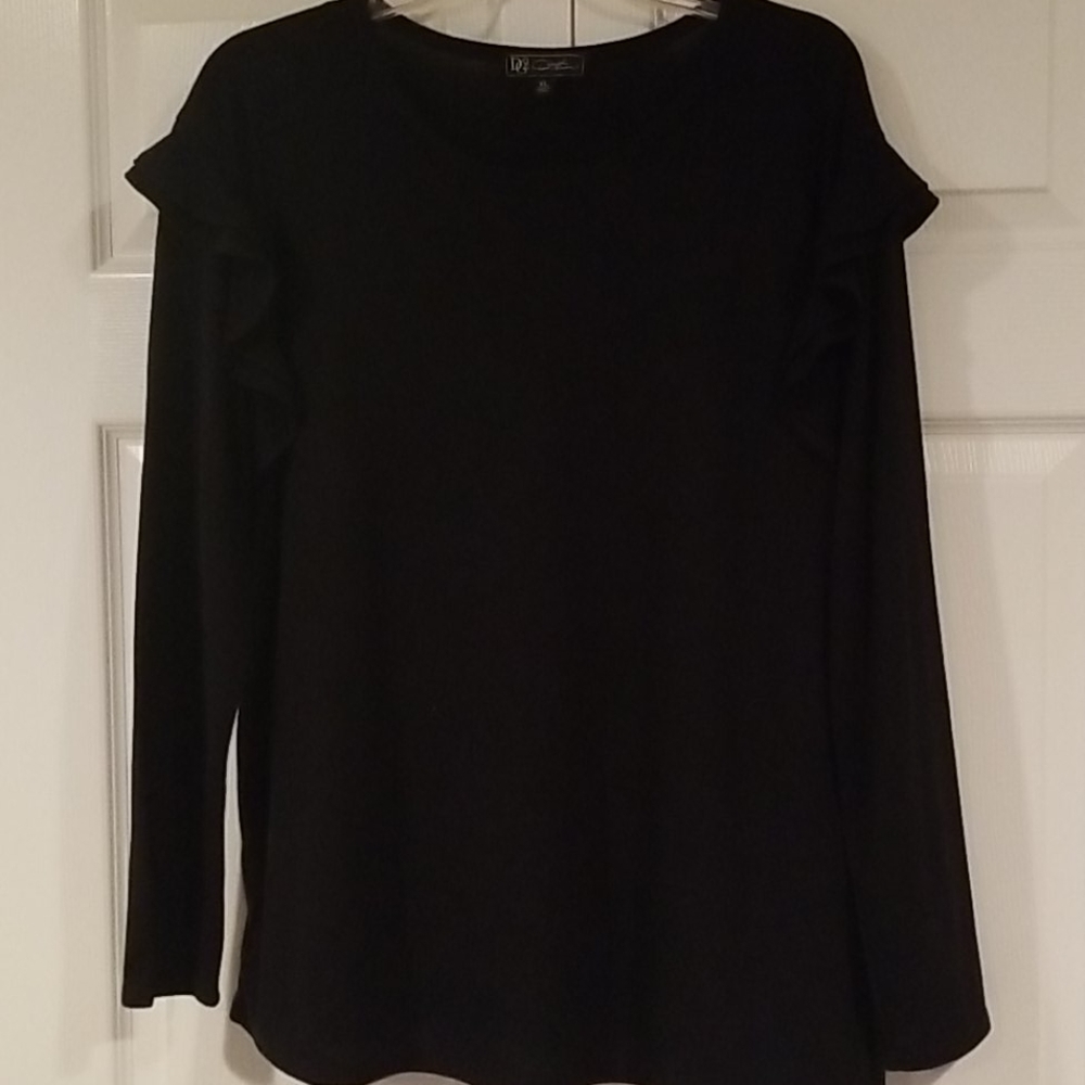 Black long sleeve top with ruffle accent